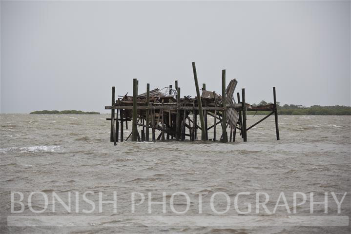 Early in the Day, the Honeymoon Shack finally gave in to Mother Nature - Tropical Storm Andrea hits Cedar Key Florida - Photo by Pat Bonish