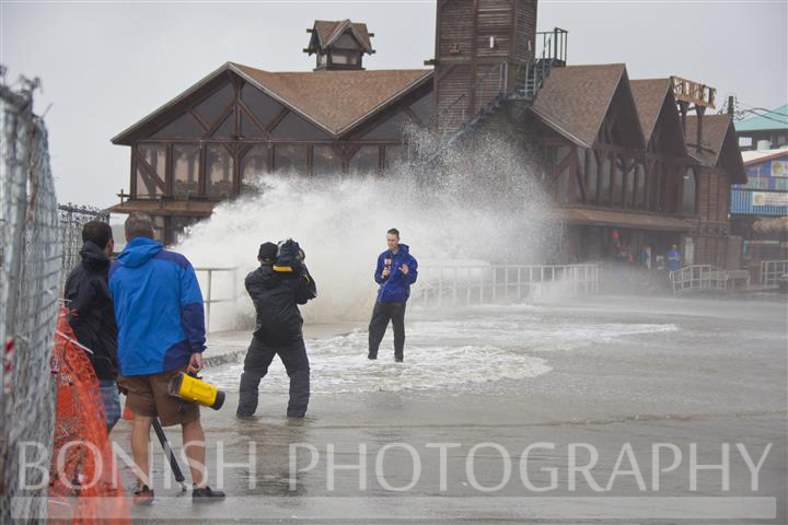 News Channels were all reporting live from Dock Street as the waves crashed into the Sea Wall - Tropical Storm Andrea hits Cedar Key Florida - Photo by Pat Bonish