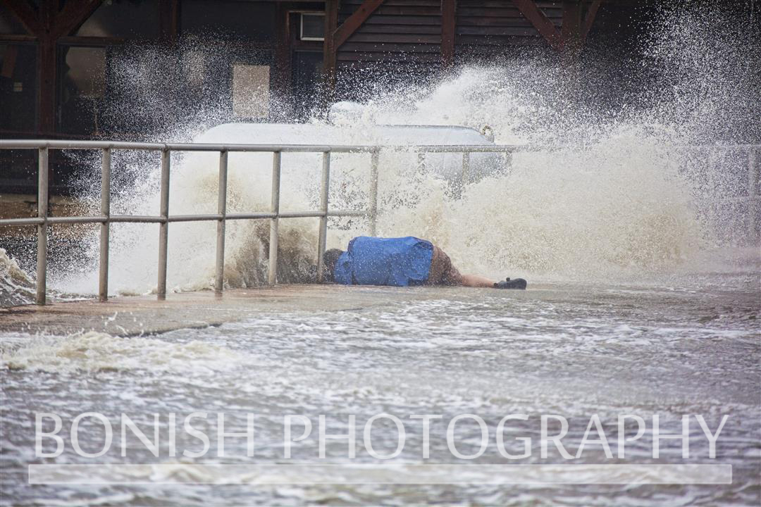 Some Cameramen will go to great lengths to get the shot - Tropical Storm Andrea hits Cedar Key Florida - Photo by Pat Bonish