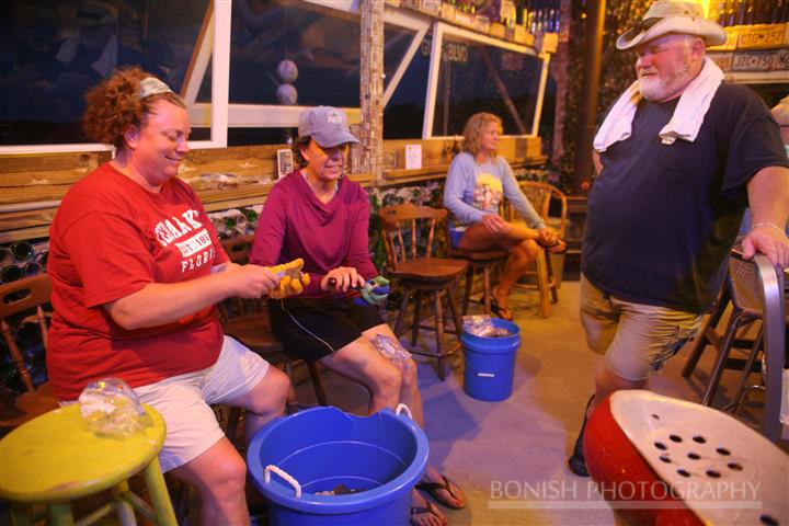 Shucking_Scallops_In_Tiki_Bar